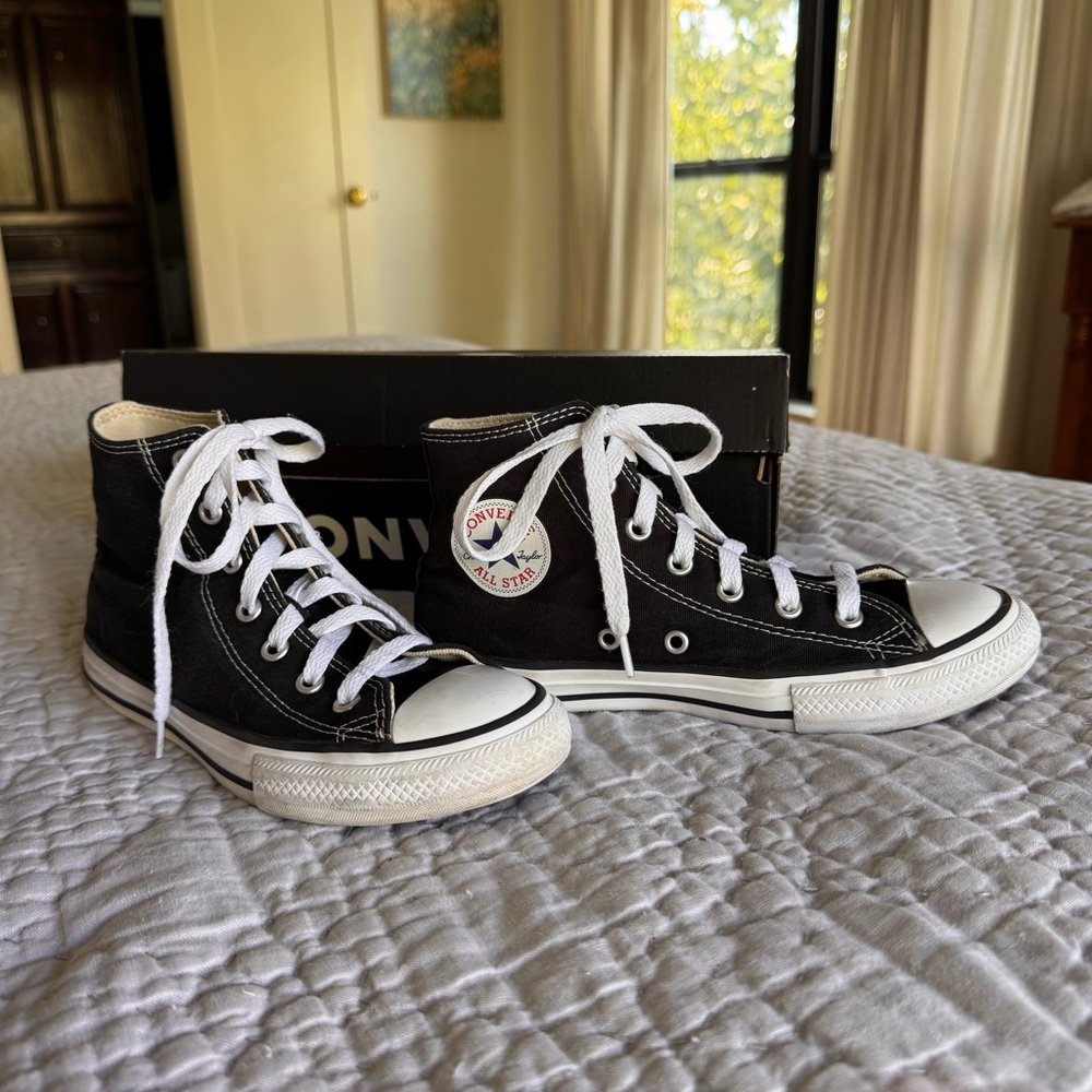 Converse Chuck Taylor All Star Black Canvas Hi-tops, big kid size 2